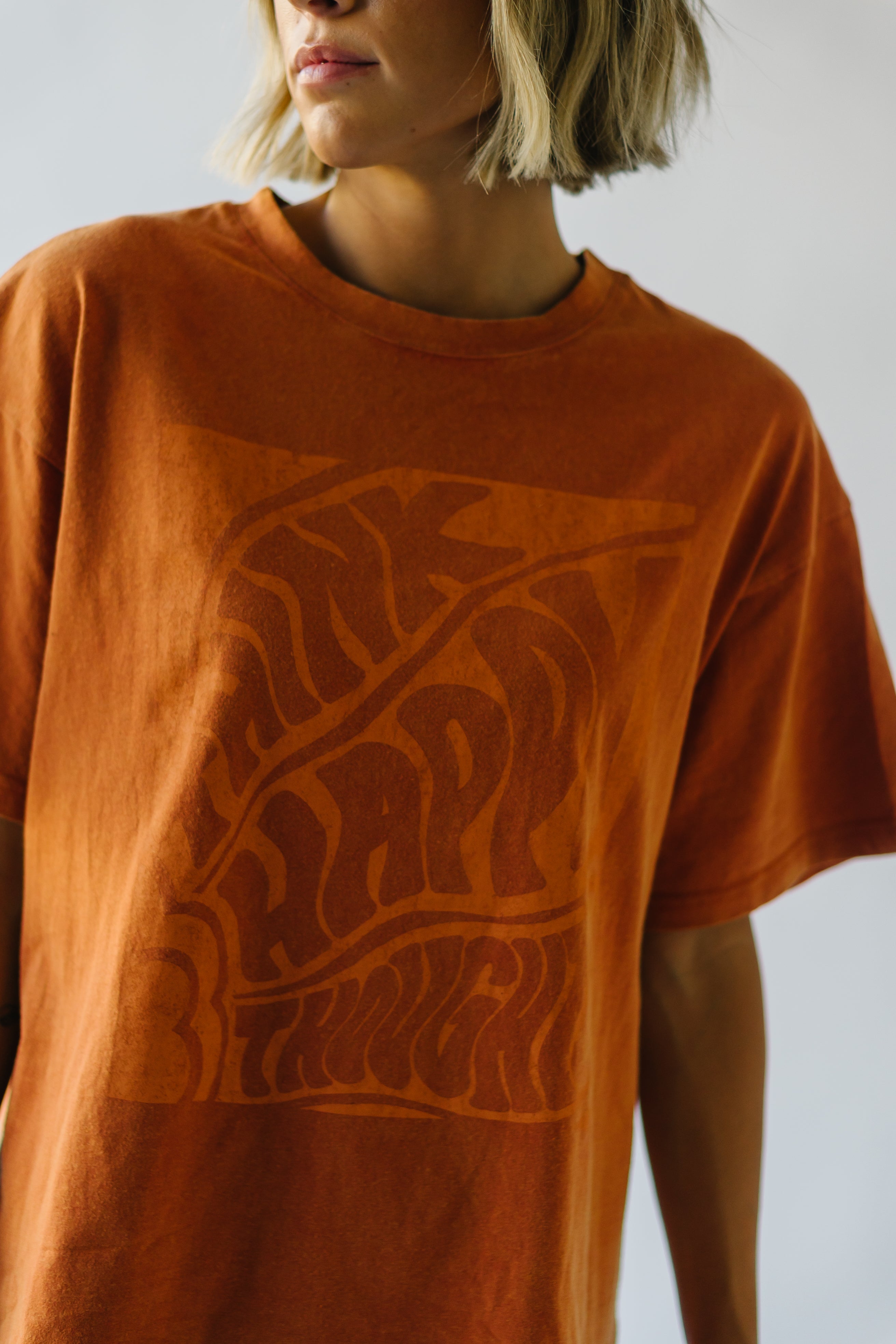 The Think Happy Thoughts Graphic Tee in Brown